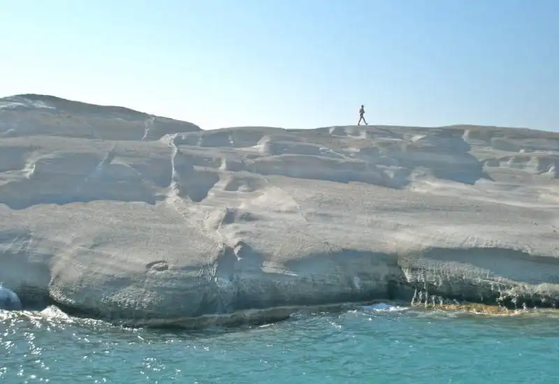 White volcanic rock coastline in Milos, Greece
